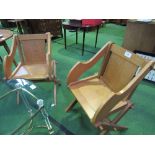 A pair of oak War Department 'Glastonbury' chairs. Estimate £80-120.