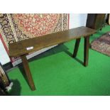 Oak 4 leg bench, 110cms x 57cms x width at base 38cms, Estimate £30-40.
