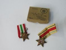 2 WWII medals in box, The Italian Star & The Africa Star. Estimate £20-30.