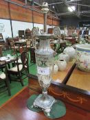 A WMF classical silver plate & glass lamp, height 54cms. Estimate £30-50.