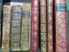 7 leather bound books (mainly 18th & 19th century). Estimate £20-30.