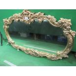 Large oval mantel mirror with decorative frame, height 96cms & 150cms