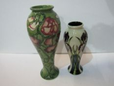 2 Moorcroft vases, height 27.5cms & 21.5cms