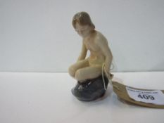 Royal Copenhagen nude girl on rocks. Estimate £40-50.