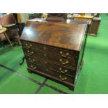 Mahogany bureau on bracket feet with 4 graduated drawers, 99cms x 51cms x 104cms. Estimate £50-80.