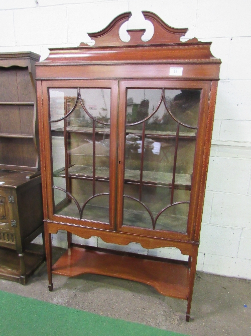 Edwardian mahogany display cabinet with glass double door above under shelf, on tapered legs, 185cms