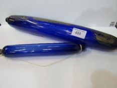 2 Blue Bristol Glass Rolling Pins with ship decorations. Estimate £20-40.