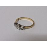 18ct gold & platinum ring with large central diamond flanked by 2 smaller diamonds, size T, weight