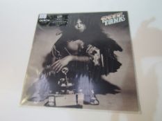 T Rex (tanx) LP coloured vinyl & poster in excellent condition. Estimate £20-25.