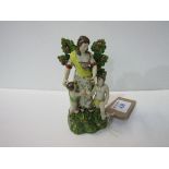 Circa 1820 porcelain figurine of mother & 2 children. Estimate £90-110.