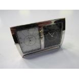 Links of London dual folding Time Travel alarm clock in chrome finish. Estimate £10-15.