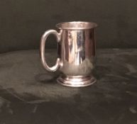 Christening tankard by Joseph Gloster Ltd in 1966, 80mm tall, wt 76 gms. Estimate £40-50.