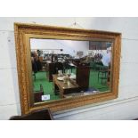 Gilt frame wall mirror, 94cms x 68cms. Estimate £5-10.