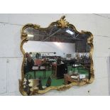 Ornate framed wall mirror, 80cms x 70cms. Estimate £10-20.