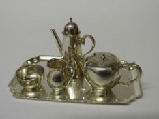 Hallmarked silver miniature tea set (5 piece), Birmingham 1949, makers TD&S. Weight 1.690ozs.