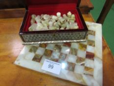 Onyx chess set & board with pieces in decorative box. Estimate £30-40.