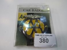 An AA badge in it's packaging. New. Estimate £5-10.