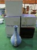 5 Wedgwood Jasperware vases in original boxes. Estimate £10-20.