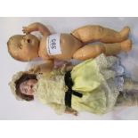 2 bisque dolls (1 marked WG)