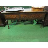 18th century oak low dresser with 3 drawers & a shaped ogee apron to cabriole front legs.