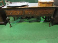 18th century oak low dresser with 3 drawers & a shaped ogee apron to cabriole front legs.