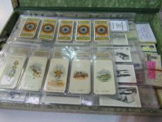 Box of cigarette cards - Brook Bond, Players WDHO Wills, Carrera & Cadet Sweets. Estimate £100-120.