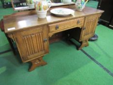 Oak 1930's style dressing table, 146cms x 45cms x 133cms. Estimate £10-20.