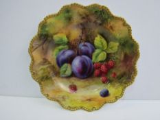 Royal Worcester plate of painted plums & raspberries, signed T Lockyer.  Estimate £350-370.