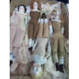 Box of 4 vintage china puppets. Estimate £30-50.