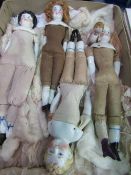 Box of 4 vintage china puppets. Estimate £30-50.