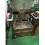 Oak hall seat with rising lid. Estimate £10-20.