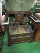 Oak hall seat with rising lid. Estimate £10-20.