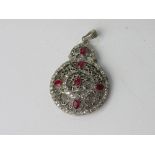 925 pendant with Indian rubies & emeralds. Estimate £25-35.