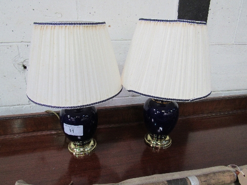 Pair of blue cream ceramic & brass table lamps & shades. Estimate £5-10.