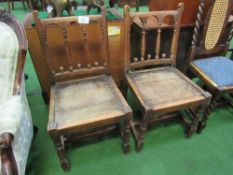 2 oak framed hall chairs. Estimate £10-15.