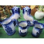 2 blue & white Staffordshire-style dogs & 3 blue & white graduated jugs