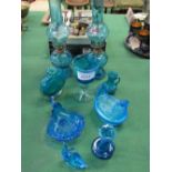 Qty of blue glass ware including a pair of oil lamps. Estimate £10-20.
