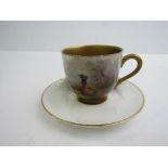 Royal Worcester porcelain coffee cup and saucer decorated with pheasants, with heavily gilded