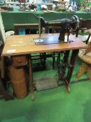 Treadle Singer sewing machine. Estimate £30-50.