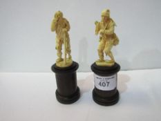 2 carved bone figurines. Estimate £30-50.