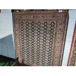 Blue ground Bokhara carpet, 2.3 x 1.60. Estimate £60-70.