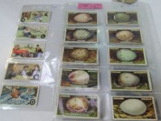 2 sets of Ogden cigarette cards, birds eggs & ABC of Sport. Estimate £80-100.