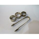 3 silver napkin rings, 2.2ozt & a pair of Georgian silver sugar tongs, 1.6ozt