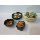 2 Moorcroft ashtrays, 1 Moorcroft covered dish, a Moorcroft trinket box & a Moorcroft small dish