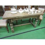 Oak draw-leaf dining table on heavy turned supports & centre stretcher, 153cms x 76cms x 79cms.