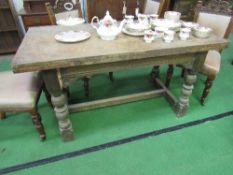 Oak draw-leaf dining table on heavy turned supports & centre stretcher, 153cms x 76cms x 79cms.