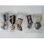 Qty of 5 Masonic medals with ribbons. Estimate £15-20.