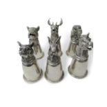 6 Gucci silver plated hunting cups. Estimate £650-700.
