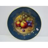 19th century Royal Worcester plate of fruit and foilage painted within a blue and gilt border,