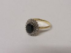 18ct gold ring with large oval shaped sapphire & diamond surround, 4.5gms, size K 1/2. Estimate £